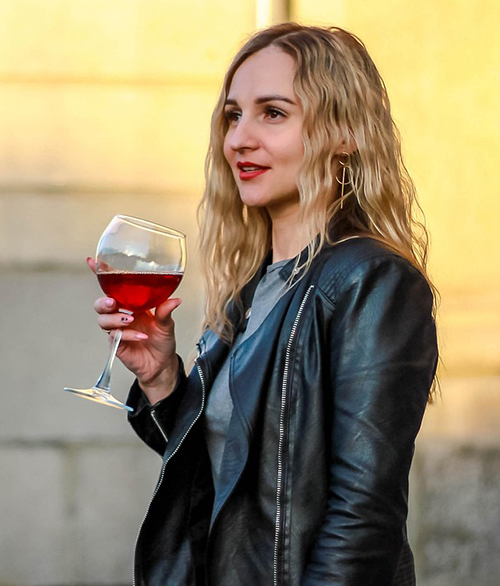 woman with glass of wine